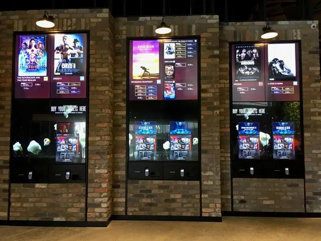 A Zytronic multi touch cinema wall and ticket dispenser