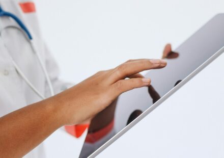 A doctor using a touchscreen